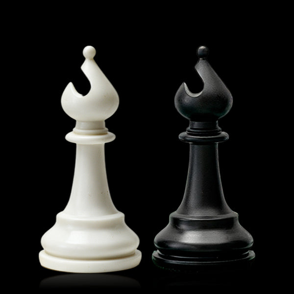 Best Chess Set Ever 3X ivory and black bishops side by side on black
