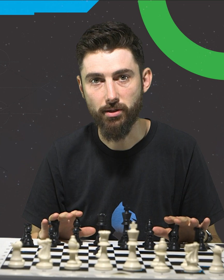 Galen Pyle, creator of Best Chess Set Ever, at a chessboard